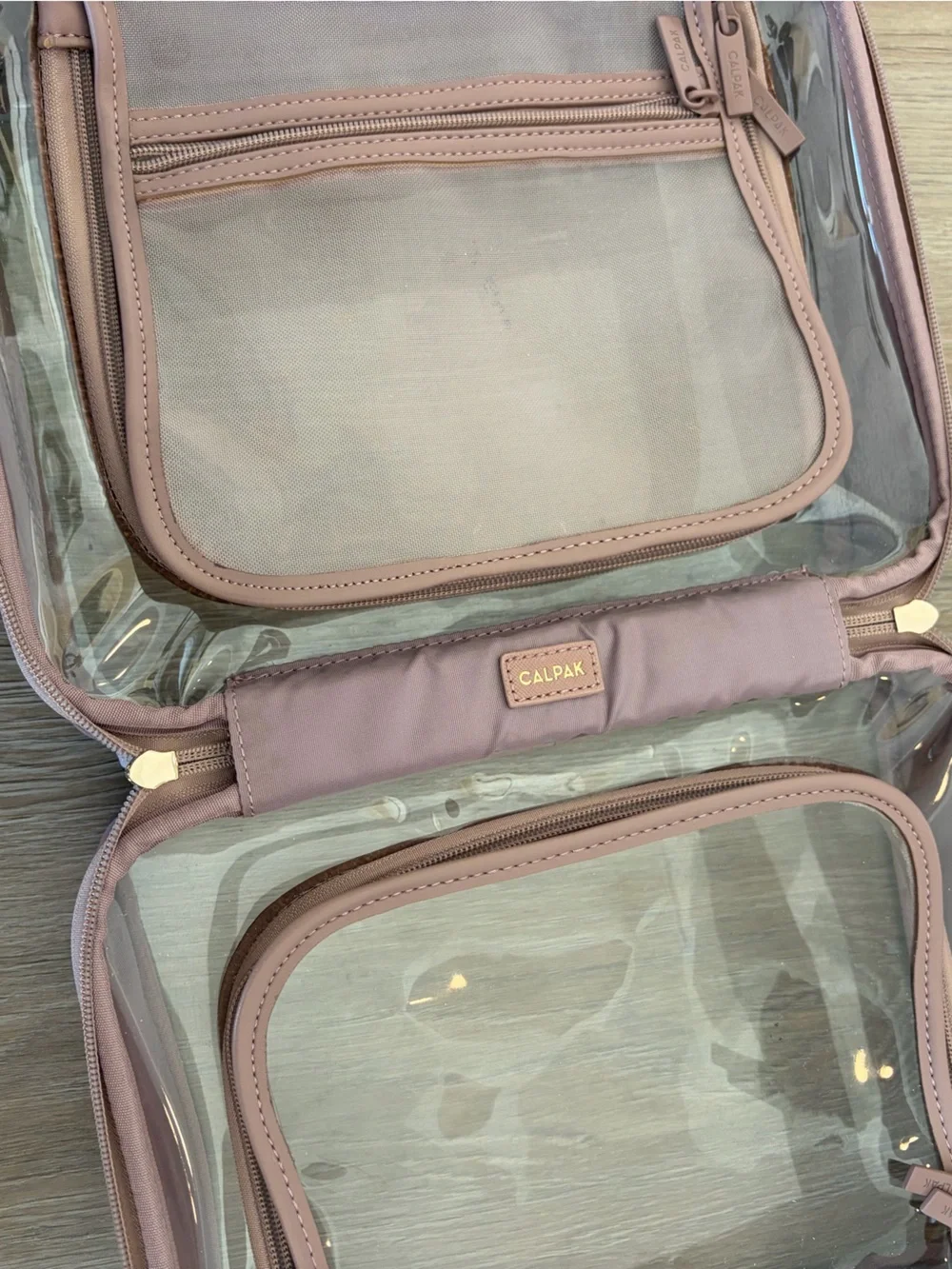 CALPAK Large Clear Cosmetics Case in Mauve/Pink